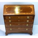 A late 18th Century mahogany and satinwood cross-banded bureau, with marquetry decoration, slope