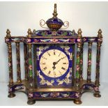 A 20th century brass and cloisonné enamel mantel clock, the circular white dial with Roman