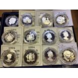 Twelve various silver proof commemorative coins including 2 x '2000 Guernsey £5', 'Jamaica 1994 $