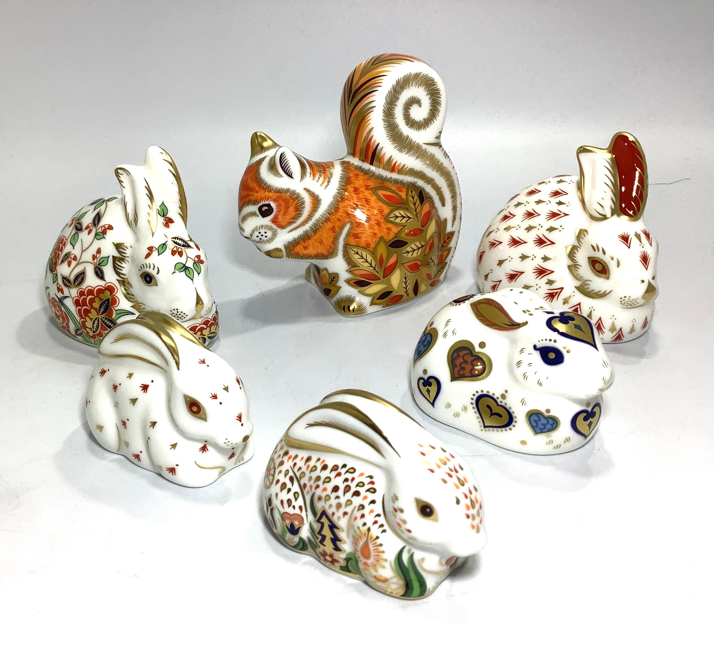 Six assorted Royal Crown Derby paperweights comprising 'Meadow Rabbit', 'Autumn Squirrel', 'Red