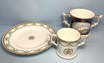 Two Royal Crown Derby loving cups and a plate comprising 'Prestige Christening Loving Cup',