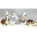 Three various Royal Crown Derby paperweights comprising 'Donkey', 'Llama' and 'Donkey Foal', all