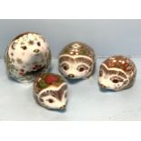 Four assorted Royal Crown Derby Hedgehog paperweights comprising 'Strawberry' the summer