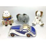 Four assorted Royal Crown Derby paperweights, primarily from 'Treasures of Childhood' series,