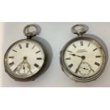 Two various silver-cased open-face pocket watches, each with white enamel dials, Roman numerals