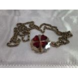 A 9ct gold belcher link chain with glass pendant with four red hearts formed as a stylised four leaf