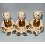 Three Royal Crown Derby Number Bears, '0' and '7' and '8', with printed marks to base, gold stoppers