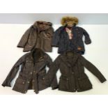 A collection of four women's jackets including a black Barbour diamond-quilted jacket with fleece