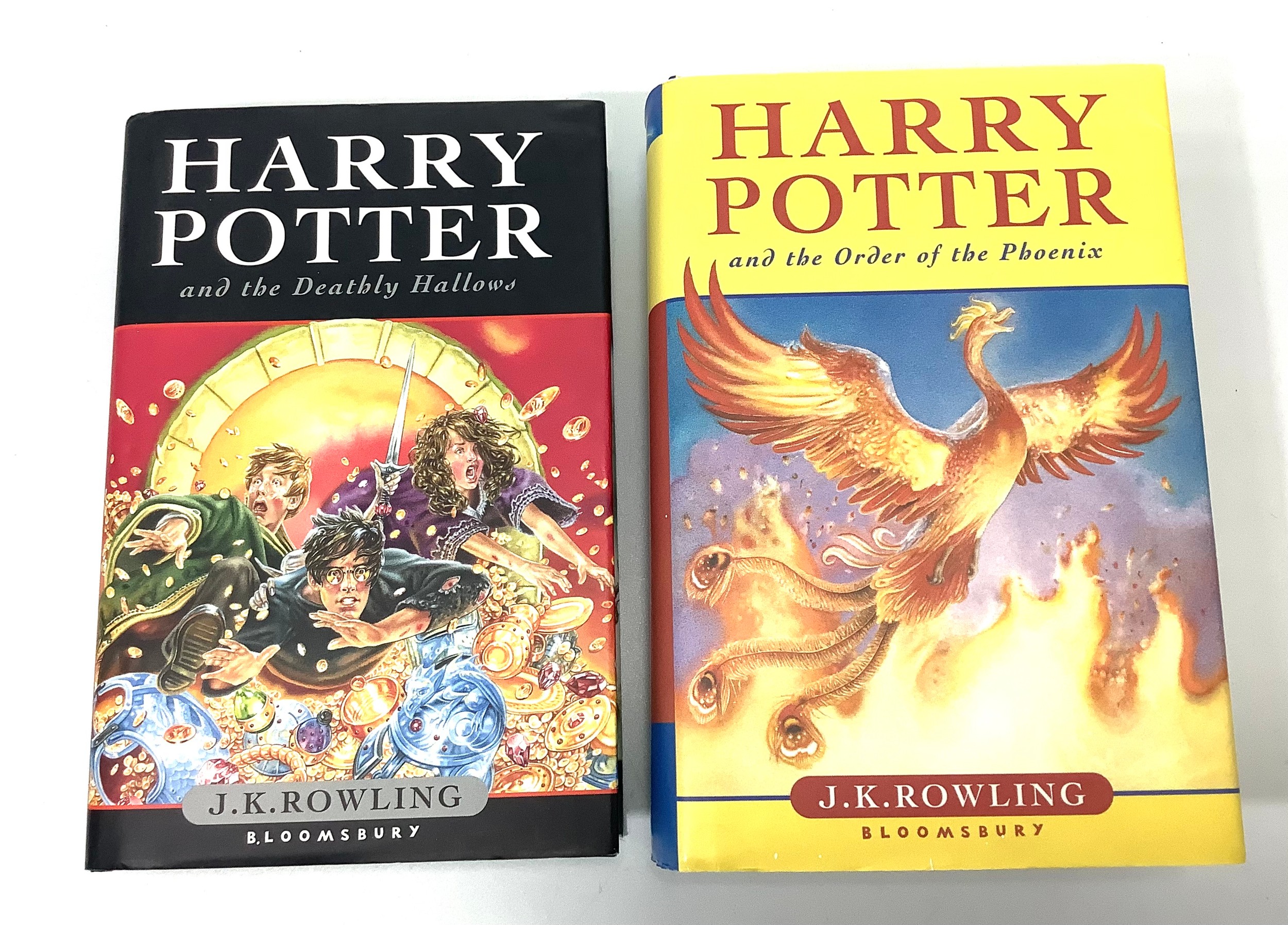 Two Hardcover volumes of Harry Potter, including Harry Potter and the Order of the Phoenix, dated