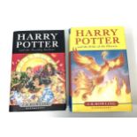 Two Hardcover volumes of Harry Potter, including Harry Potter and the Order of the Phoenix, dated