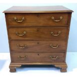 A 19th century mahogany secretaire chest of four long drawers with original brass handles and