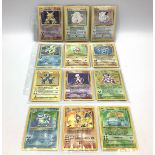 A sheet of 20 Original vintage 1990's Wizards Of The Coast 1999 Pokemon Trading Card Game Pokemon