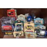 Approx. 50 die cast model vehicles including buses and vans in perspex display case, Noel's House