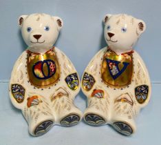 A pair of Royal Crown Derby Alphabet Bears, 'O' and 'V', with printed marks to base, gold stoppers