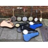 For restoration, spares or repair, nine various banjo-ukuleles, including four hard cases (as found)