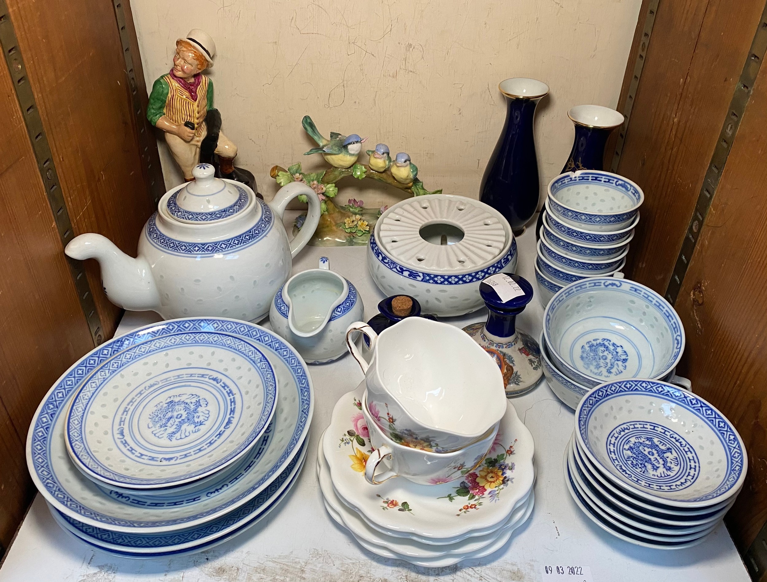 A quantity of Chinese blue and white porcelain 'rice ware', together with two Coalport porcelain