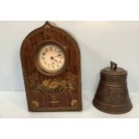 Two early 20th century biscuit tins, one modelled as an inlaid mantel clock, the other a Huntley &