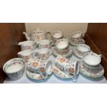 Minton 'Haddon Hall' porcelain part tea and coffee services comprising teapot, nine teacups and