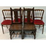 A set of four bentwood style spindle back chairs with deep red upholstered seats, together with a