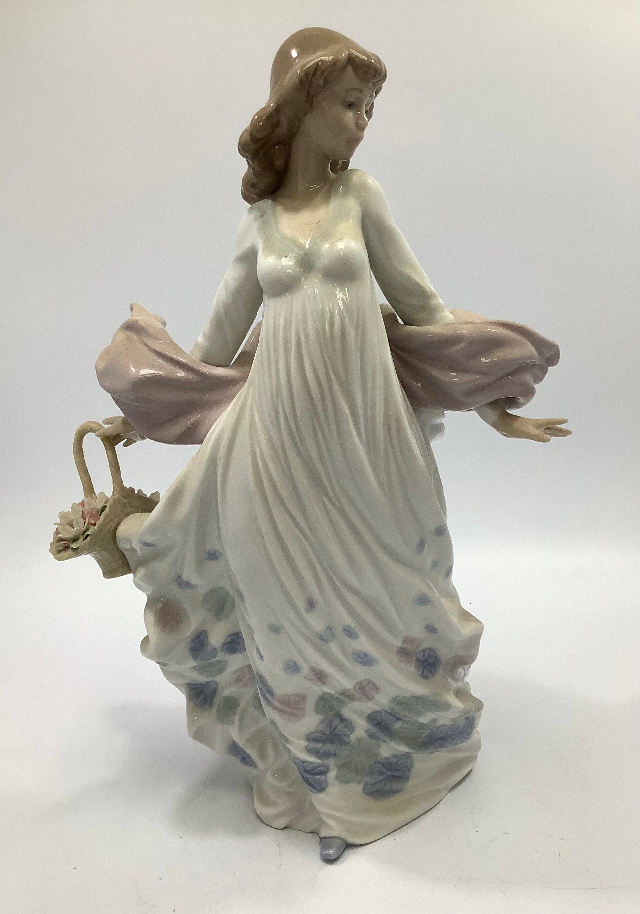 A Lladro porcelain figure 'Spring Splendor' number '05898', in original box with packaging, 29cm