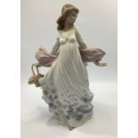 A Lladro porcelain figure 'Spring Splendor' number '05898', in original box with packaging, 29cm