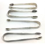 Four assorted pairs of Georgian silver sugar tongs including examples by Thomas Streetin, hallmarked