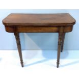 A 19th century figured mahogany folding tea table with rosewood cross-banded top, ebony stringing to