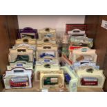 A collection of approximately 50 boxed die-cast model vehicles comprising Lledo Days Gone and