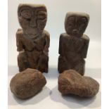 Two various South American double-sided stone fertility statues together with two possibly