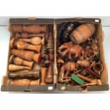 Two large boxes of wooden items including carved vases, elephants, seahorse, squirrel, mug and a