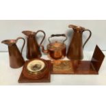 Three graduated copper jugs, two by Beldray and one by JS&S, together with a copper kettle,