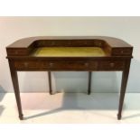 An Edwardian 'style' mahogany desk, the top with green, gilt-tooled leather scribe and three quarter