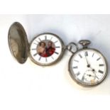 A white metal, tests as .800 grade silver or above, full-hunter pocket watch, the dial decorated