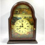 A 20th century mantel clock with burr wood effect case, the dial with scenes of wildlife to the