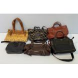 A large quantity of various designer handbags and clothing including a burgundy Michael Kors
