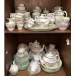 Two shelves of Copeland 'Chinese Rose' pattern dinner, tea and coffee wares (Sections 42 & 43)