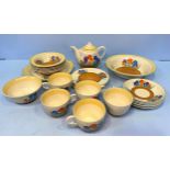 A 25-piece Royal Staffordshire Crocus by Clarice Cliff tea set comprising cups, saucers, a teapot,