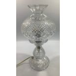 A Waterford crystal 'Inishmore' lamp, with removable bulbous top, raised on a baluster support to