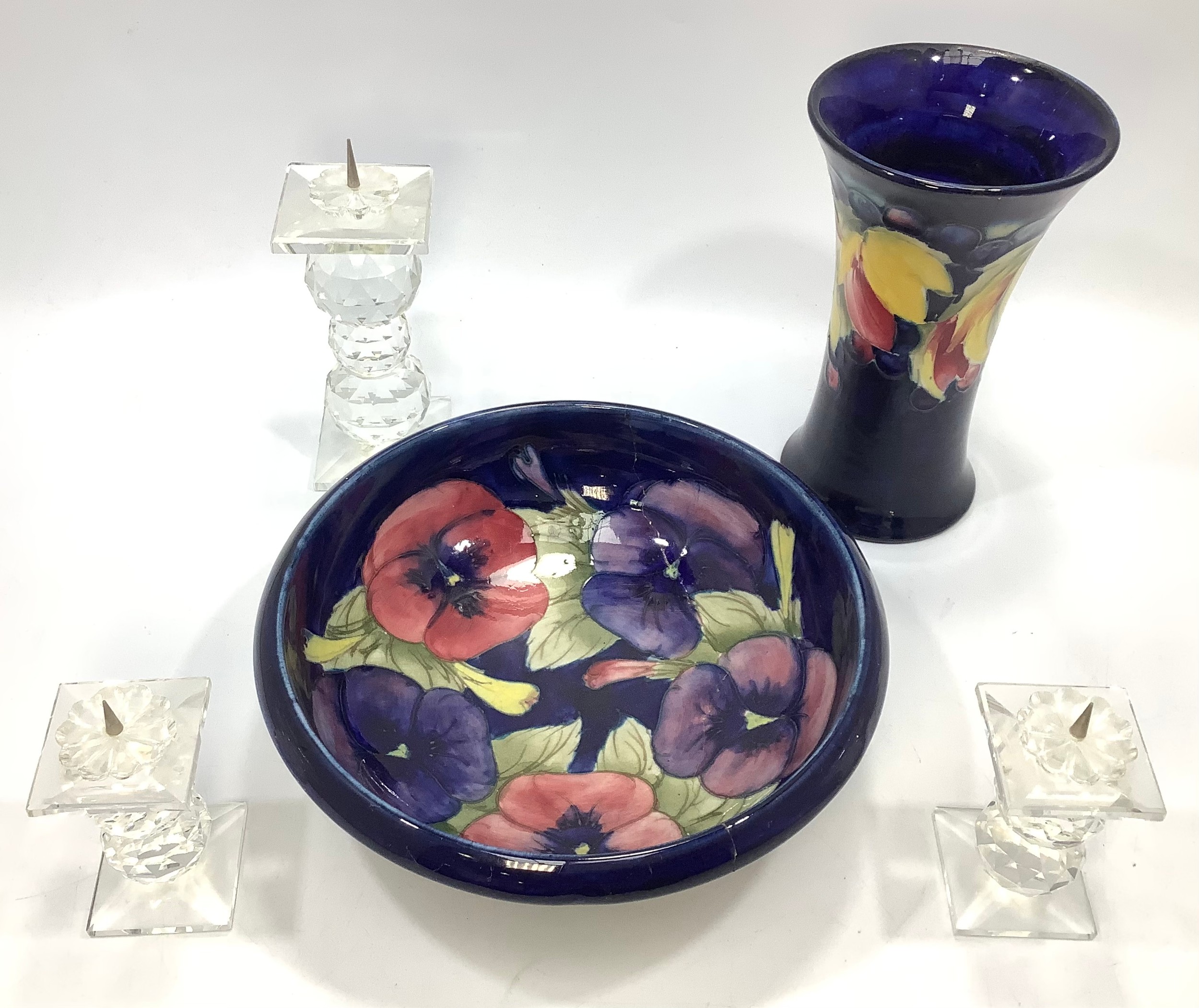 A Moorcroft bowl and vase (both af), together with a three piece Swarovski candle holder set, pair