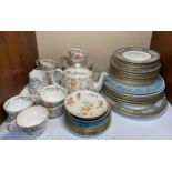 A Minton 'Haddon Hall' tea service for six comprising six-each cups, saucers and cake plates, cake