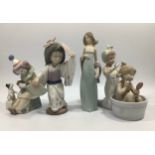Four assorted Lladro porcelain figures comprising 'Ingenue', number '05487', 'Pierrot with