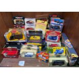 A collection of approximately 35 assorted boxed die-cast model vehicles including Matchbox, Corgi