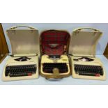 Three assorted cased vintage typewriters comprising an 'Oliver Courier', an 'Olympia Traveller C'