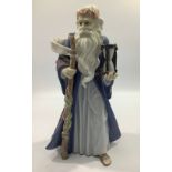 A Lladro porcelain figure 'Father Time' number '06696', in original box with packaging, 29cm tall