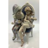 A Lladro porcelain figure 'Flirtatious Jester', number '05844', in original box with packaging, 26cm