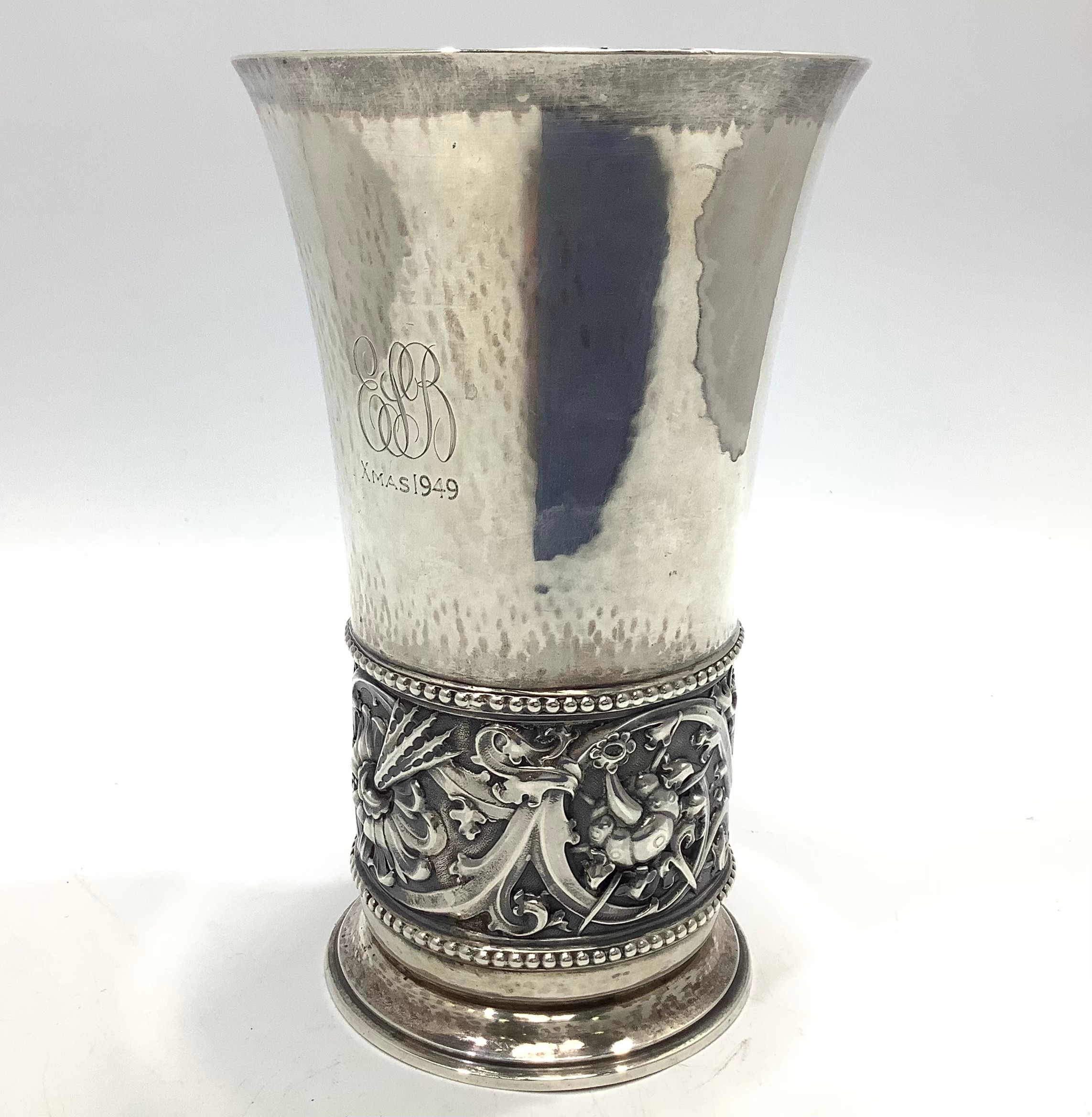 A German silver vase by Gebrüder Friedländer, of cylindrical form with flared rim and decorated with