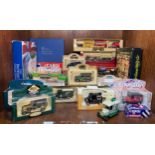 Approximately 30 boxed and loose die-cast model vehicles including Corgi and Lledo examples, with an