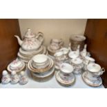 A large quantity of Paragon 'Victoriana Rose' pattern tea wares comprising teapot, four cake plates,