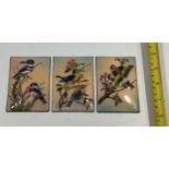 Three nicely enamelled copper plaques depicting birds amidst trees, signed J Betourne Limoges bottom