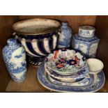 Two shelves of ceramics including a pair of large ginger jars (af), wash basin, jug and potty set (